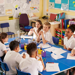School Children Working At A Table