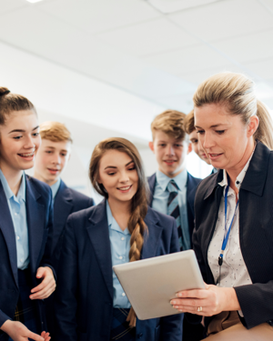 Secondary Children With Teacher And Ipad ?? title