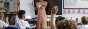 Pupils With Raised Hands