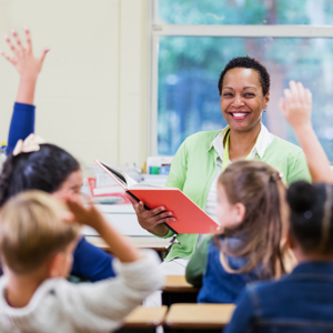 Female Teacher In Front Of Class
